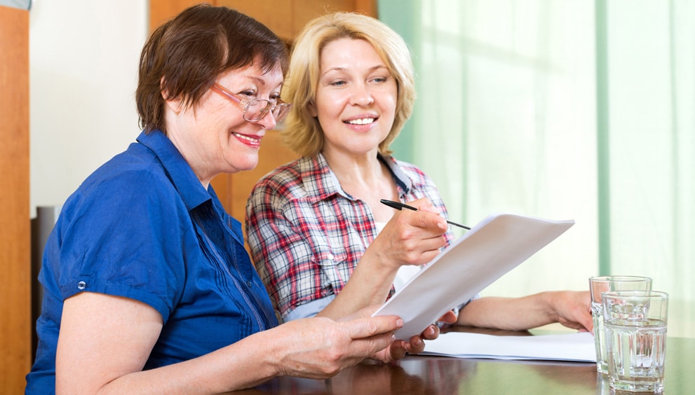 A person researching and comparing in-home care providers in Langley.